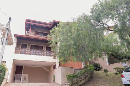 Casa de condomínio para alugar com 430m², 4 quartos e 4 vagasFachada casa