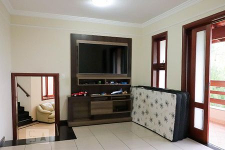 Casa de condomínio para alugar com 430m², 4 quartos e 4 vagasSala TV