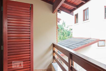 Casa de condomínio para alugar com 430m², 4 quartos e 4 vagasDormitório 1 - varanda