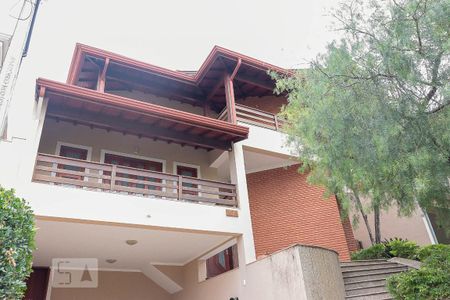 Casa de condomínio para alugar com 430m², 4 quartos e 4 vagasFachada casa