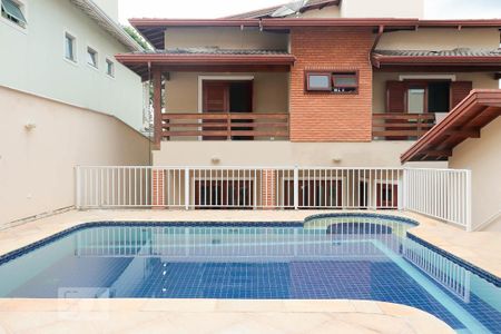 Casa de condomínio para alugar com 430m², 4 quartos e 4 vagasÁrea Externa - piscina 