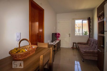 Sala de casa de condomínio à venda com 2 quartos, 50m² em Hípica, Porto Alegre