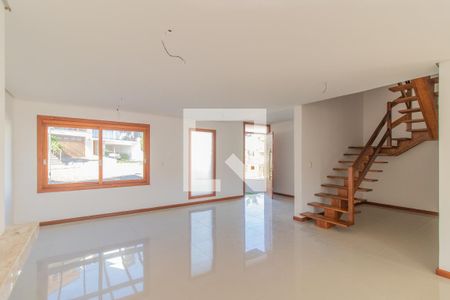 Sala de casa de condomínio à venda com 4 quartos, 240m² em Vila Nova, Porto Alegre