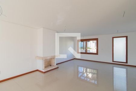 Sala de casa de condomínio à venda com 4 quartos, 240m² em Vila Nova, Porto Alegre