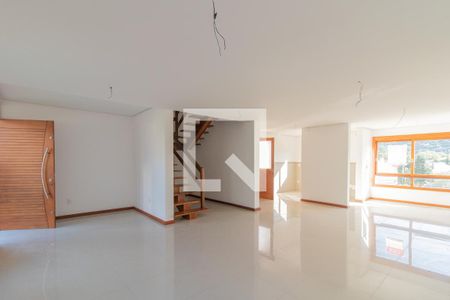 Sala de casa de condomínio à venda com 4 quartos, 240m² em Vila Nova, Porto Alegre
