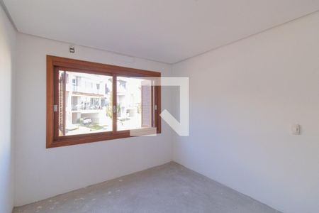 Quarto 1 de casa de condomínio à venda com 4 quartos, 240m² em Vila Nova, Porto Alegre