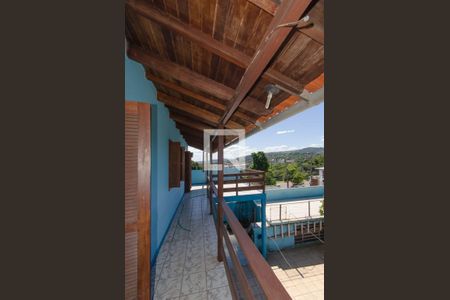 Saca Quarto 1 de casa à venda com 4 quartos, 180m² em Vila Nova, Porto Alegre