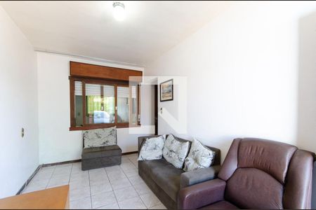 Sala de casa à venda com 4 quartos, 180m² em Vila Nova, Porto Alegre