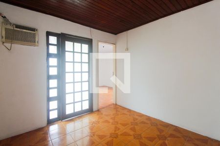 Sala de estar de casa à venda com 6 quartos, 130m² em Costa E Silva, Porto Alegre