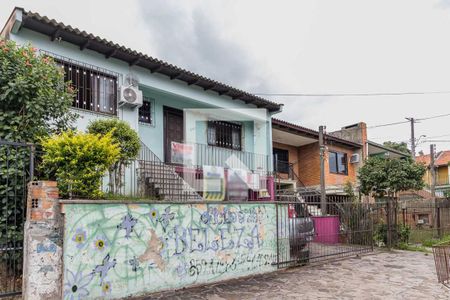 Casa à venda com 153m², 3 quartos e 2 vagas Casa à venda com 153m², 3 quartos e 2 vagasFachada