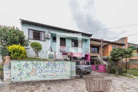 Casa à venda com 153m², 3 quartos e 2 vagas Casa à venda com 153m², 3 quartos e 2 vagasFachada