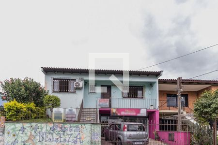 Casa à venda com 153m², 3 quartos e 2 vagas Casa à venda com 153m², 3 quartos e 2 vagasFachada
