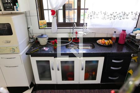 Casa à venda com 80m², 2 quartos e 2 vagas Casa à venda com 80m², 2 quartos e 2 vagasCozinha