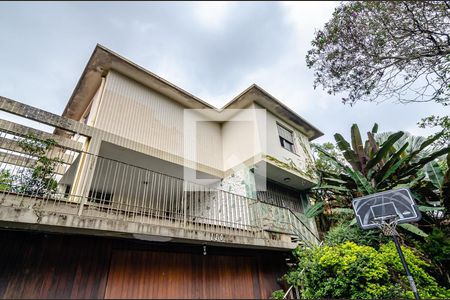 Casa à venda com 377m², 4 quartos e 4 vagas Casa à venda com 377m², 4 quartos e 4 vagasFachada