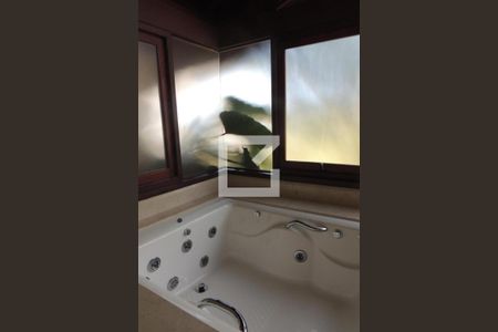 Casa de condomínio à venda com 410m², 4 quartos e 3 vagasBanheiro da Suíte 4