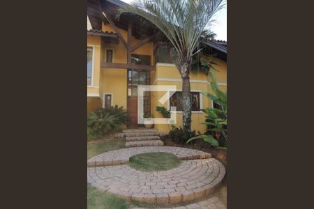 Casa de condomínio à venda com 410m², 4 quartos e 3 vagasFachada