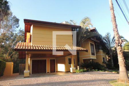 Casa de condomínio à venda com 410m², 4 quartos e 3 vagasFachada
