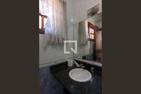 Casa de condomínio para alugar com 395m², 4 quartos e 6 vagasBanheiro da Suíte 2