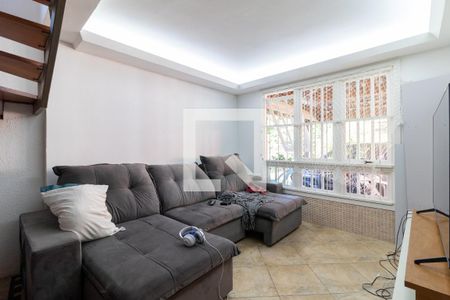 Sala de casa de condomínio à venda com 4 quartos, 150m² em Medianeira, Porto Alegre