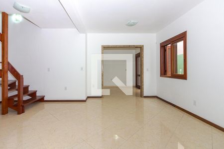 Sala de casa de condomínio à venda com 3 quartos, 136m² em Petrópolis, Porto Alegre