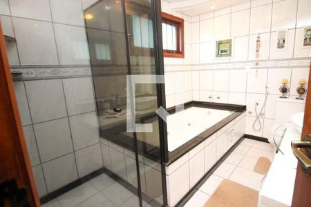 Casa à venda com 276m², 4 quartos e 3 vagasBanheiro da Suíte 1