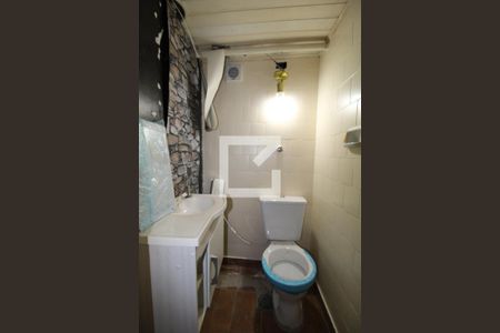 Casa à venda com 412m², 4 quartos e 5 vagasBanheiro inferior 2