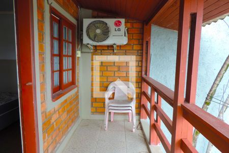 Quarto 1 - Sacada de casa de condomínio para alugar com 2 quartos, 72m² em Barra da Lagoa, Florianópolis