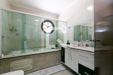 Casa à venda com 128m², 3 quartos e 3 vagas Casa à venda com 128m², 3 quartos e 3 vagasBanheiro-Suite 1