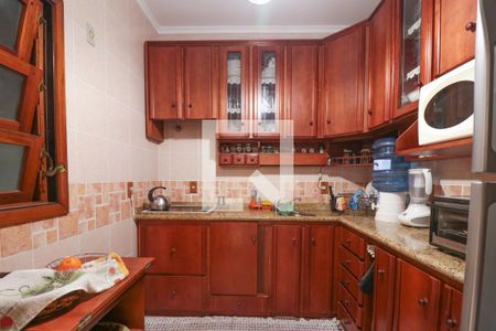 Casa de condomínio à venda com 258m², 3 quartos e 2 vagasCozinha e Área de Serviço