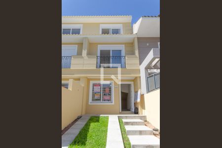 Casa à venda com 110m², 3 quartos e 2 vagasFachada do Prédio e Garagem