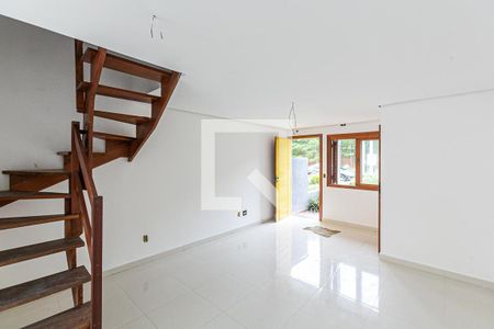 Sala de casa à venda com 3 quartos, 150m² em Guarujá, Porto Alegre