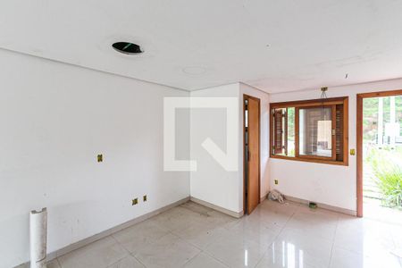 Sala de casa à venda com 3 quartos, 150m² em Guarujá, Porto Alegre