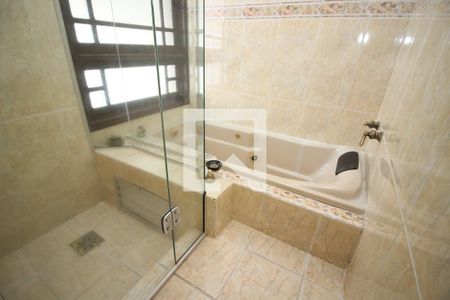 Casa de condomínio à venda com 367m², 4 quartos e 2 vagasBanheiro da Suíte