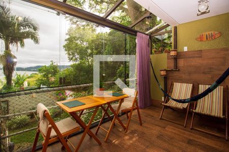 Varanda da Sala de casa à venda com 3 quartos, 230m² em Espirito Santo, Porto Alegre