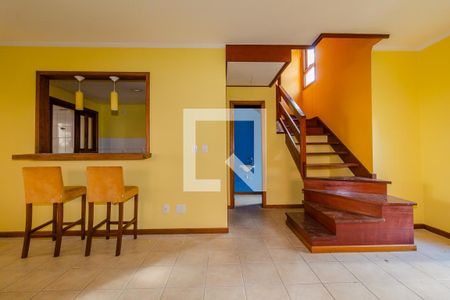 Sala de casa de condomínio à venda com 3 quartos, 132m² em Espirito Santo, Porto Alegre