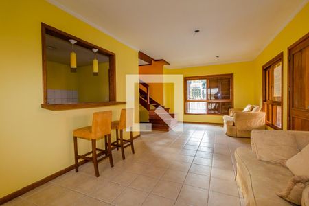 Sala de casa de condomínio à venda com 3 quartos, 132m² em Espirito Santo, Porto Alegre