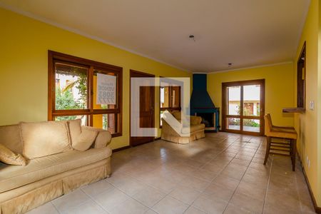 Sala de casa de condomínio à venda com 3 quartos, 132m² em Espirito Santo, Porto Alegre