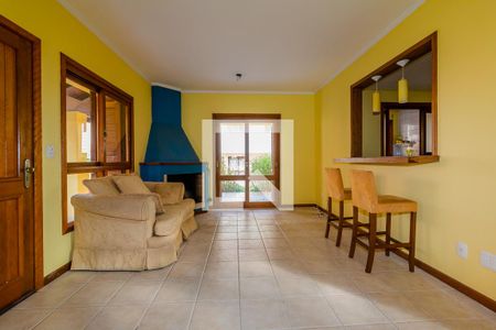 Sala de casa de condomínio à venda com 3 quartos, 132m² em Espirito Santo, Porto Alegre