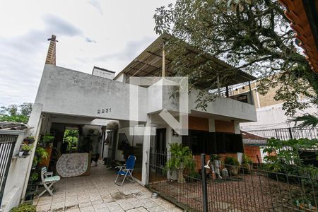 Casa à venda com 155m², 5 quartos e 3 vagas Casa à venda com 155m², 5 quartos e 3 vagasFachada