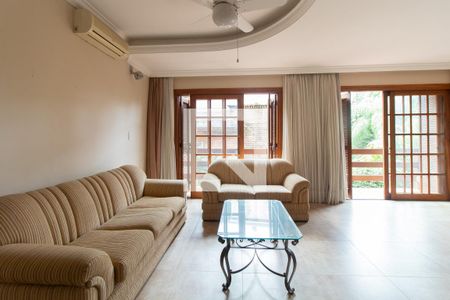 Sala de casa de condomínio para alugar com 3 quartos, 500m² em Cavalhada, Porto Alegre