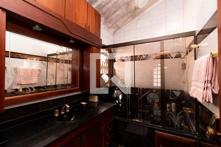 Casa à venda com 387m², 4 quartos e 4 vagasBanheiro Quarto 4 - Suíte