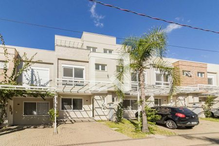 Casa de condomínio à venda com 191m², 4 quartos e 2 vagas Casa de condomínio à venda com 191m², 4 quartos e 2 vagasFachada