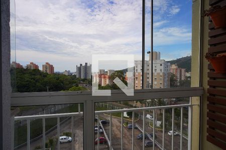 varanda de apartamento à venda com 2 quartos, 57m² em Jardim Carvalho, Porto Alegre