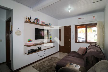 Sala de casa de condomínio à venda com 2 quartos, 60m² em Estância Velha, Canoas
