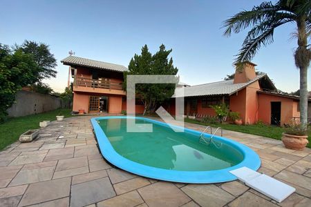 Casa à venda com 411m², 4 quartos e 3 vagasPiscina
