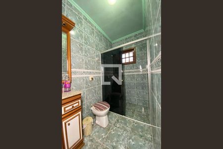 Casa à venda com 411m², 4 quartos e 3 vagasBanheiro da Suíte 4