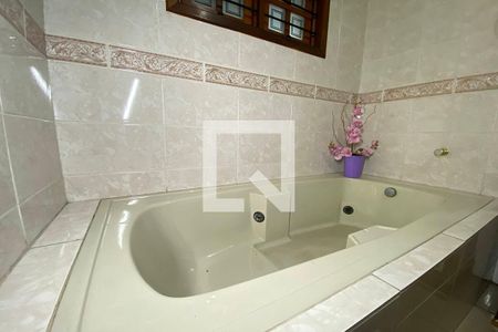 Casa à venda com 411m², 4 quartos e 3 vagasBanheiro da Suíte 3