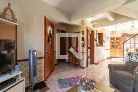 Sala de casa de condomínio à venda com 3 quartos, 178m² em Ipanema, Porto Alegre