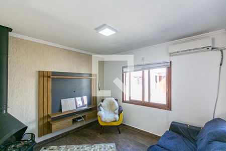 Sala de casa de condomínio à venda com 2 quartos, 72m² em Campo Novo, Porto Alegre