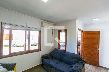 Sala de casa de condomínio à venda com 2 quartos, 72m² em Campo Novo, Porto Alegre